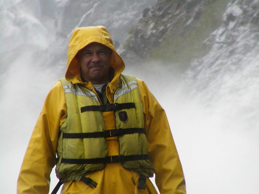 Eddie Goff standing near a glacier