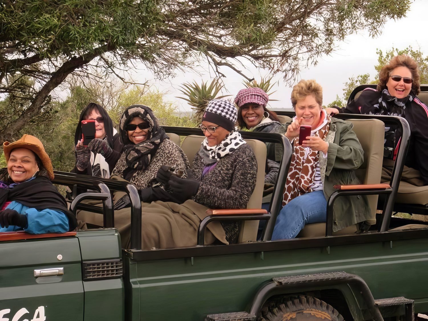 A group of women from Leadership Women is in a open-air truck in Kareiga Game Reserve in South Africa