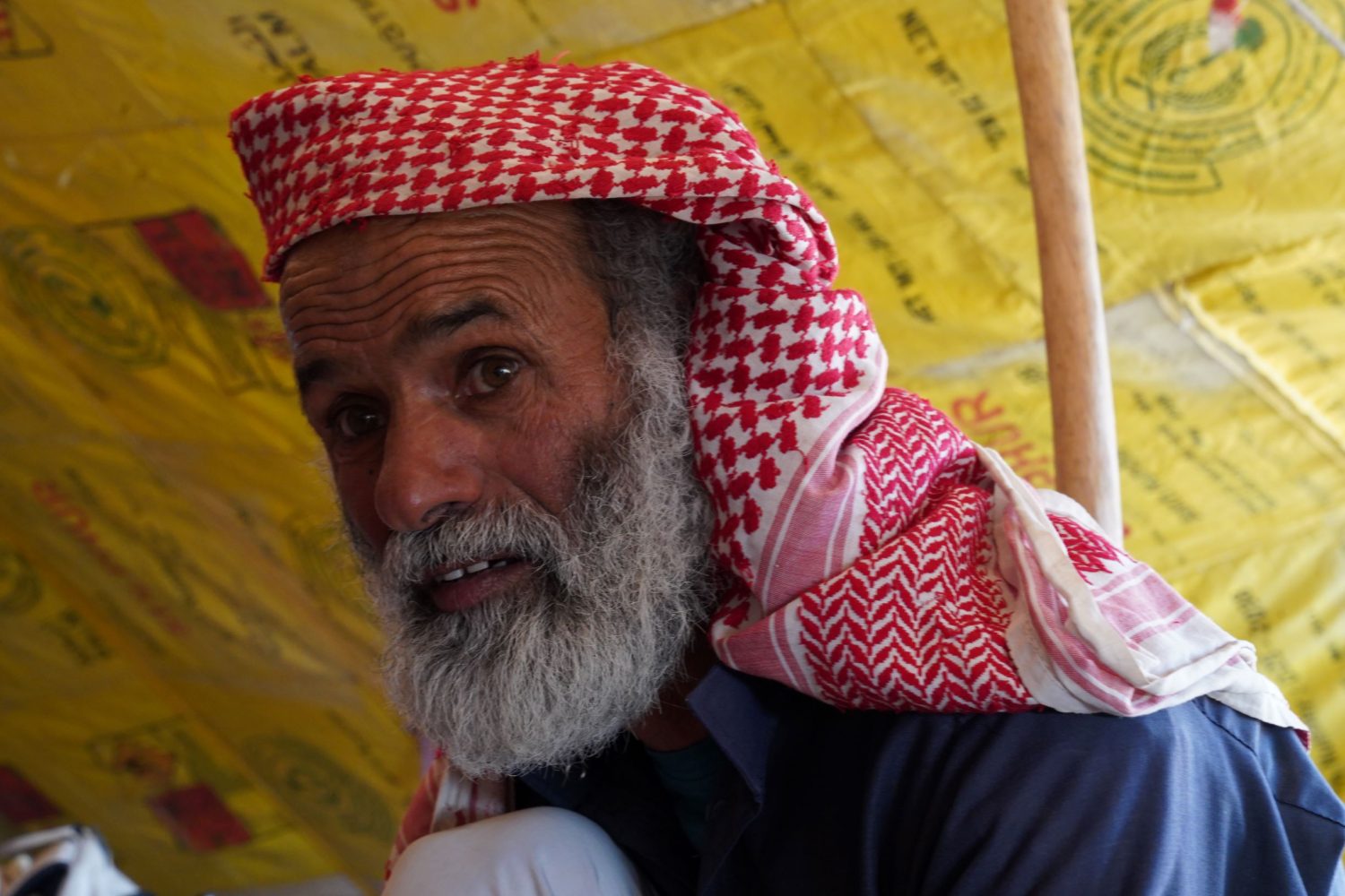 Bedouin host answers questions in his home near Dana Biosphere Reserve, Wadi Arabah, Jordan, image by Marie Goff
