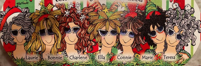 A headshot cartoon image of seven girlfriends.