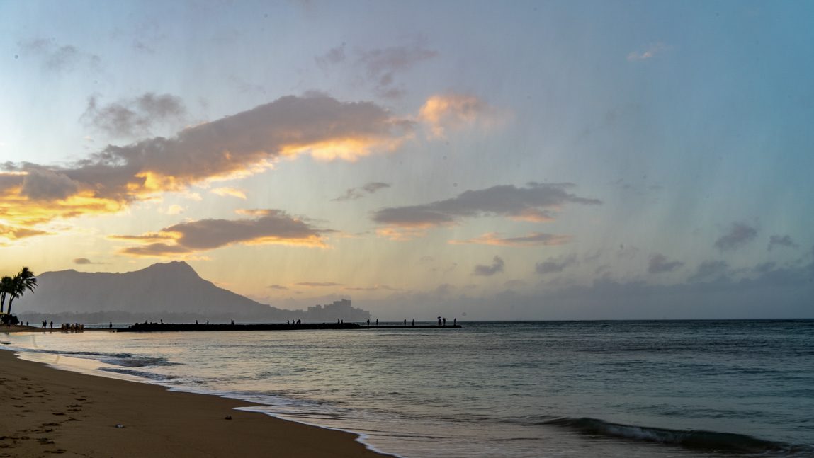 Exploring Oahu on Waikiki Beach looking across to Diamond Head
