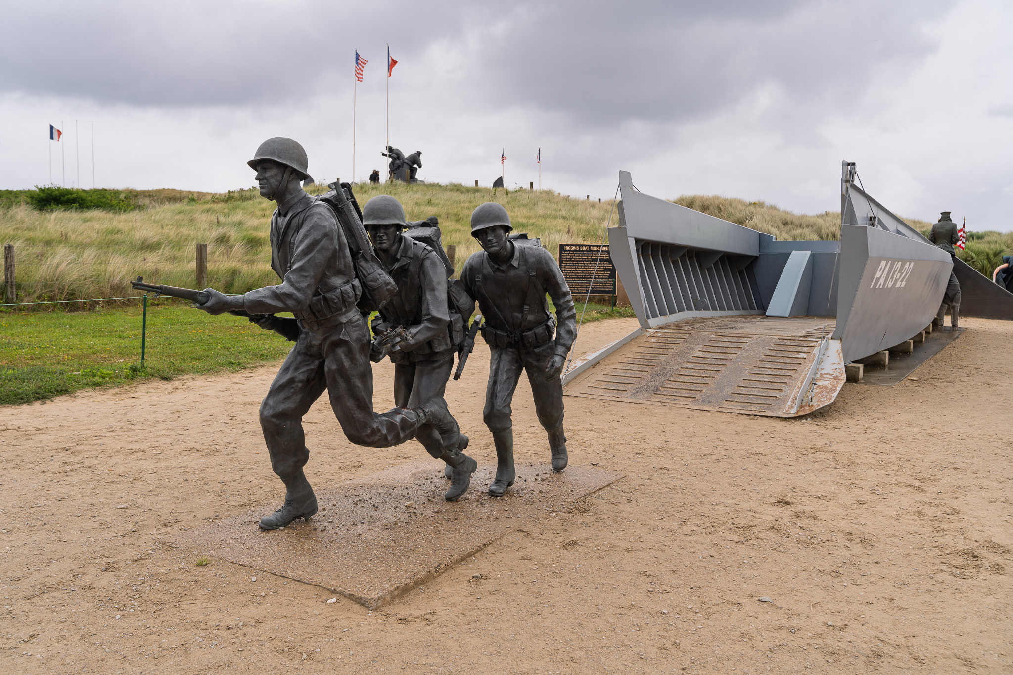 Higgins Boat Monument at Utah Beach is a statue of three Troops landing and running on the beach on D-Day.