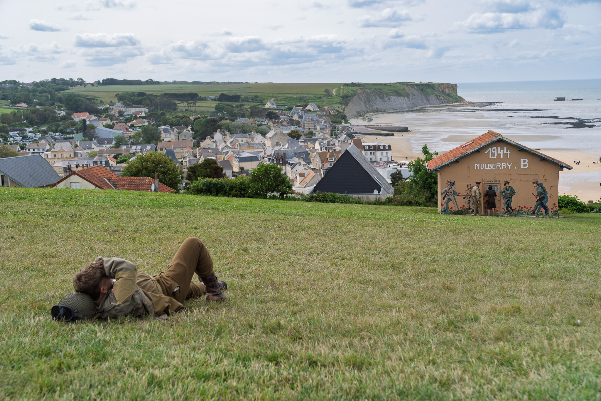 Reenactors taking pictures of each other on the anniversary of D-Day