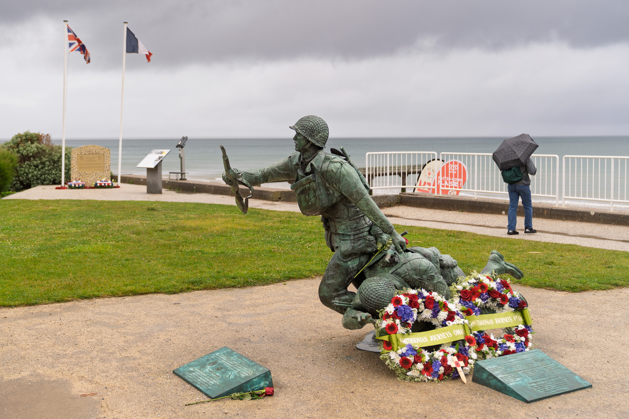 Ever Forward 29th Division Memorial with a lifesize statue of a Soldier dragging his fallen comrad.