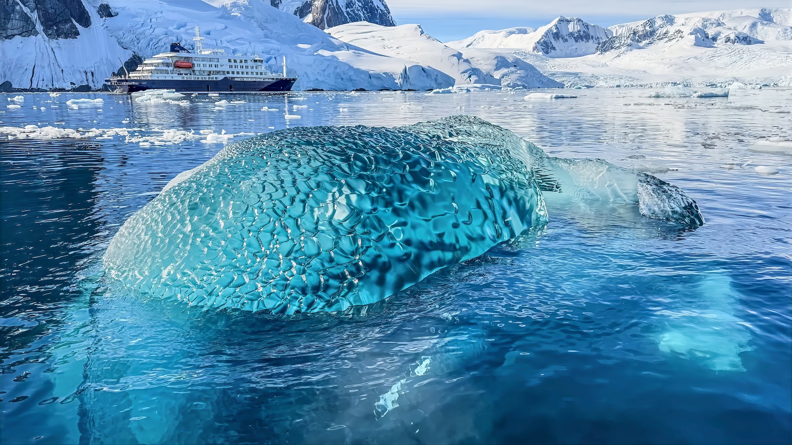 Deeply blue “Glass ice” floating in Antarctic waters is highly compressed glacial ice that holds valuable geological information.