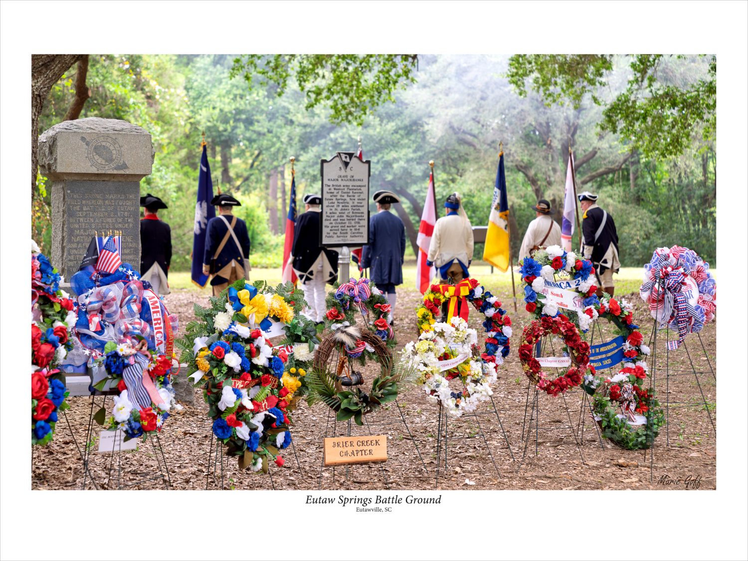 Reenactors stand at attention at a ceremony at Eutaw Springs Battlefield, one of South Carolina's Revolutionary War Sites.