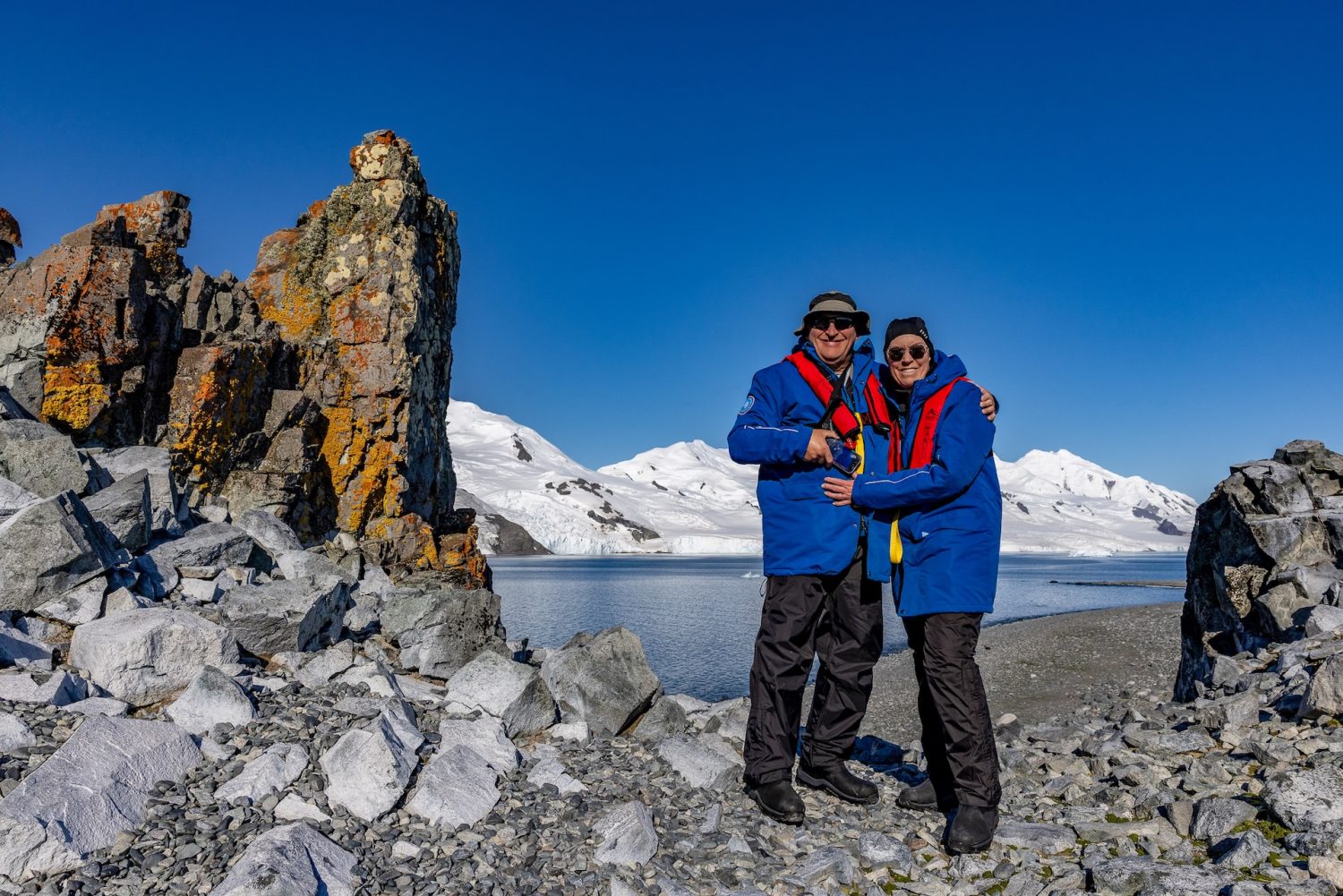 Scott and Donna Paul-Bonham posing for a picture at Red Rock Ridge in Antarctica