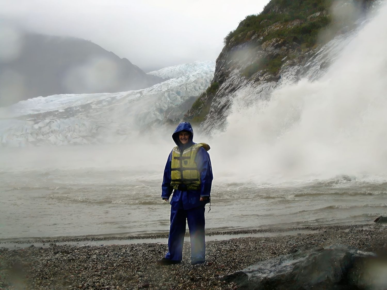 Rowing close to Mendenhall Glacier in Alaska, Marie Goff and others got out and stood on a small pebble beach with the outburst from the glacier roaring behind us.